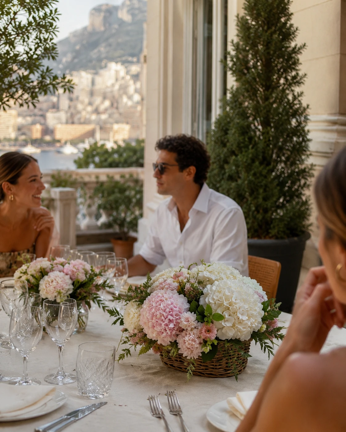 Private celebration floral design with candles and premium flowers