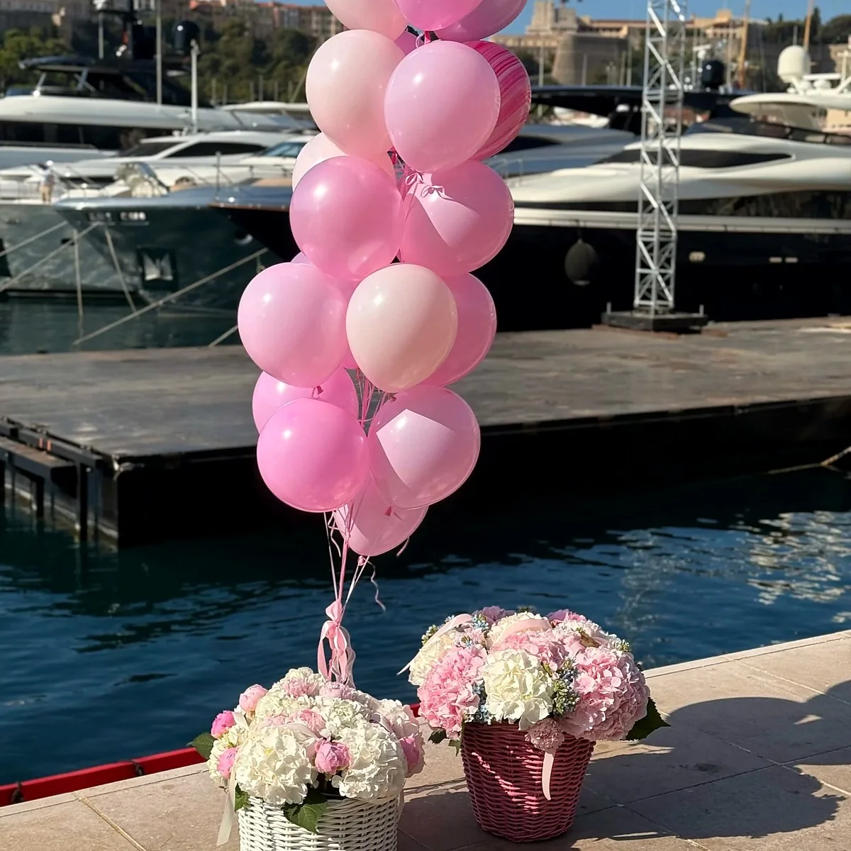 Saint Barbara Flowers celebration flowers and balloons at a Monaco marina