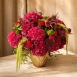 Crimson Medusa luxury exotic flowers in gold vase detail by Saint Barbara Flowers